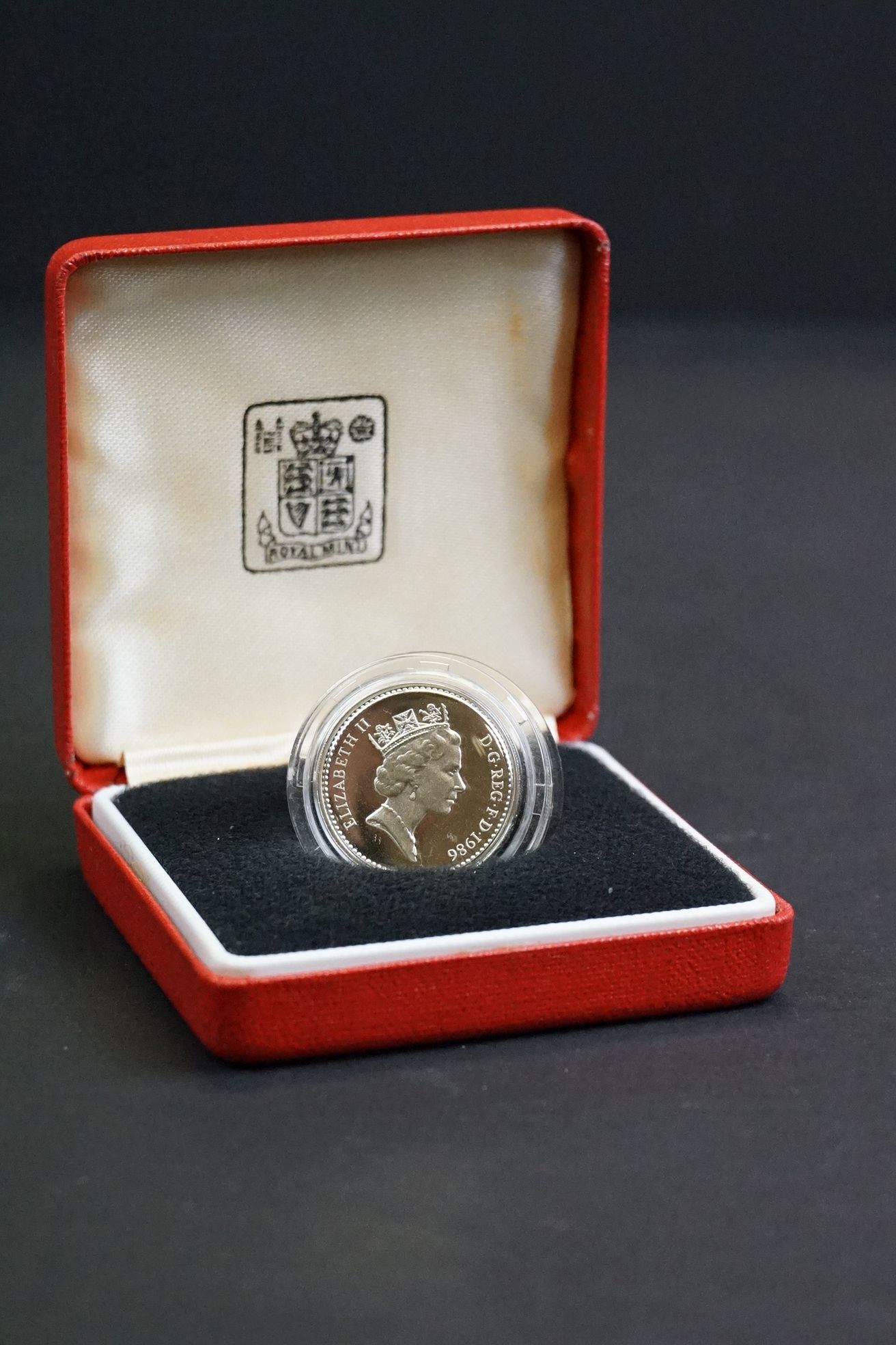 A collection of four Royal Mint United Kingdom silver proof £1 / one pound coins to include 1986, - Image 2 of 10