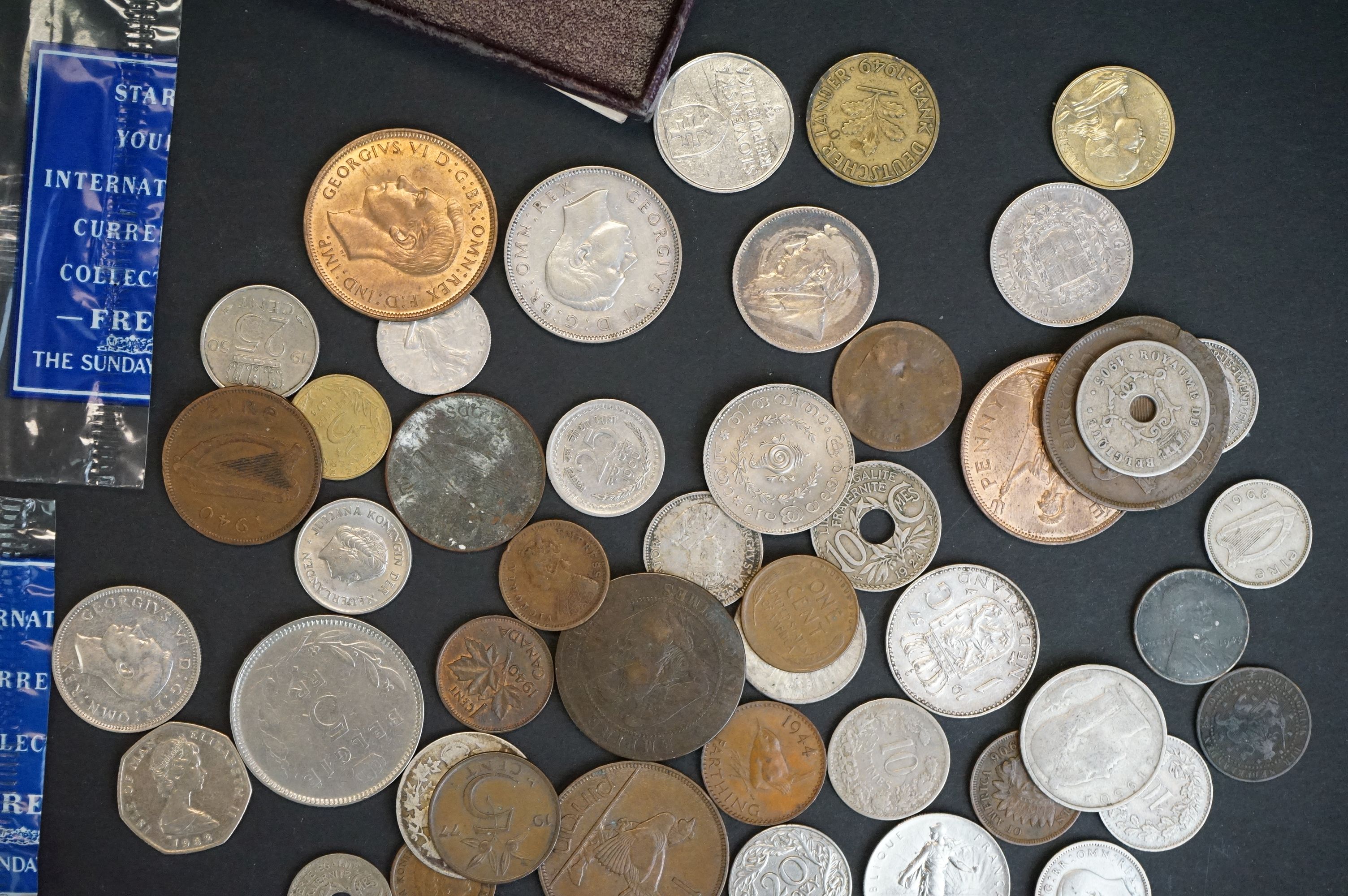 A small collection of British and foreign coins and banknotes to include commemorative crowns, pre - Image 7 of 11