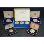 A collection of five cased medallion sets to include a silver proof Isle of Man 1976 Horse Tram