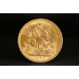 A United Kingdom Queen Elizabeth II gold full sovereign coin dated 1965.