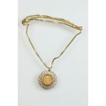 Full sovereign coin pendant necklace, George V dated 1915, 9ct gold mount, 9ct yellow gold flat curb