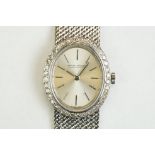 Jaeger-LeCoultre diamond 18ct white gold ladies wristwatch, champagne oval dial, baton numerals,
