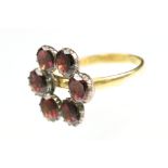 Garnet 22ct yellow gold ring, the early 19th century garnet head comprising six round flat cut