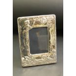 Silver easel back photograph frame depicting maidens picking apples, makers John Bull Ltd,