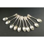 Ten Edwardian silver Apostle finial coffee spoons, makers mark rubbed, hallmarked London 1902,