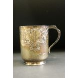 Edwardian silver Christening mug, embossed foliate scroll decoration, vacant cartouche, circular