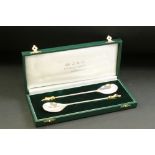 Pair of silver parcel gilt Queen's Beast spoons, planished bowls, gilt terminals, makers Richard