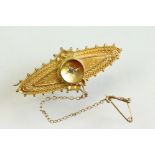 Victorian Etruscan revival diamond 15ct yellow gold brooch, small old cut diamond to the centre,