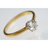 Diamond solitaire 18ct yellow gold and platinum set ring, the oval cushion cut diamond weighing