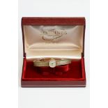 Longines 9ct yellow gold ladies wristwatch, circular cream dial, gold-coloured baton numerals and