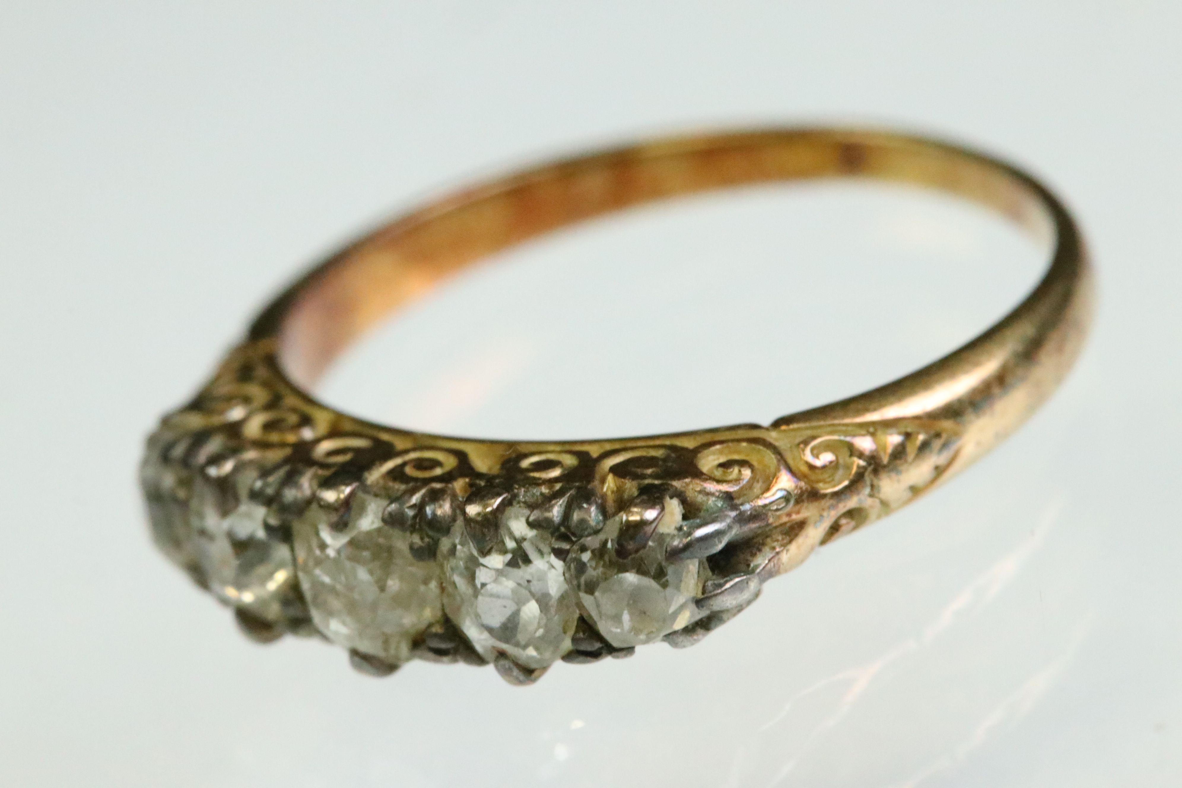 Victorian diamond unmarked yellow gold five stone ring, five graduated old cushion cut diamonds,