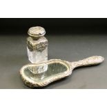 William Comyns silver topped scent bottle (af) together with a silver backed hand mirror (af) (2)