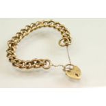 9ct yellow gold curb link bracelet, with padlock clasp and safety chain, each link stamped .375