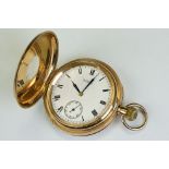 Waltham 9ct yellow gold top wind half hunter pocket watch, white enamel dial and seconds dial, black