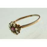 Victorian garnet and pearl 9ct rose gold flower head ring, pink-purple round mixed cut garnet to the