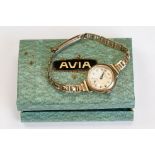 Avia 9ct yellow gold ladies wristwatch, champagne dial and seconds dial, black Arabic numerals,