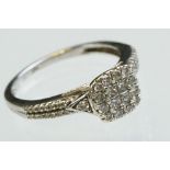 Diamond unmarked white gold cluster ring, square cut and round brilliant cut diamonds to the head,