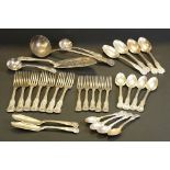 Matched Kings pattern mixed silver flatware to include teaspoons, table spoons, forks, sauce ladles,