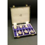 Six George III silver teaspoons, bright cut feathered and floral decoration, initialled terminals,