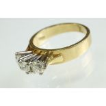 Diamond three stone 18ct yellow and white gold set ring, three round brilliant cut diamonds, total