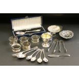 Collection of silver to include ashtray; napkin rings, bon bon dish, sugar tongs, coffee spoons,