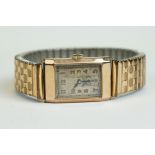 Gents 9ct gold cased wristwatch, champagne rectangular dial and seconds, dial, gilt Arabic numerals,