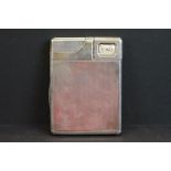 Alfred Dunhill & Sons - A rare silver combination cigarette case, with integrated lighter and