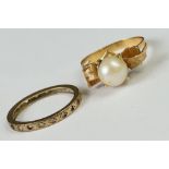 A yellow metal and pearl ladies dress ring together with a ladies eternity ring.