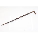 Hardwood Walking Stick, the shaft carved with an entwined snake, 84cm long