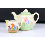 Clarice Cliff for Newport Pottery ' Spring Crocus ' Teapot and Cover, 14cm high together with