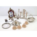 A collection of mixed silver plate to include an epergne, fruit bowl...etc together with a set of