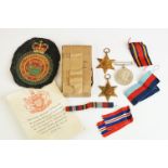 A British World War Two full size medal group of three to include the 1939-45 War Medal, the 1939-45