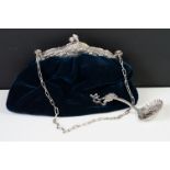 A vintage velvet bag with white metal fastener marked .800 together with a antique silver caddy