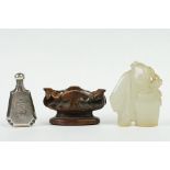 A carved jade figure on wooden base together with a oriental silver scent bottle signed to base.