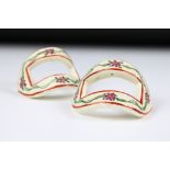 Pair of 19th century English creamware pattern shoe buckles decorated with garlands of flowers,
