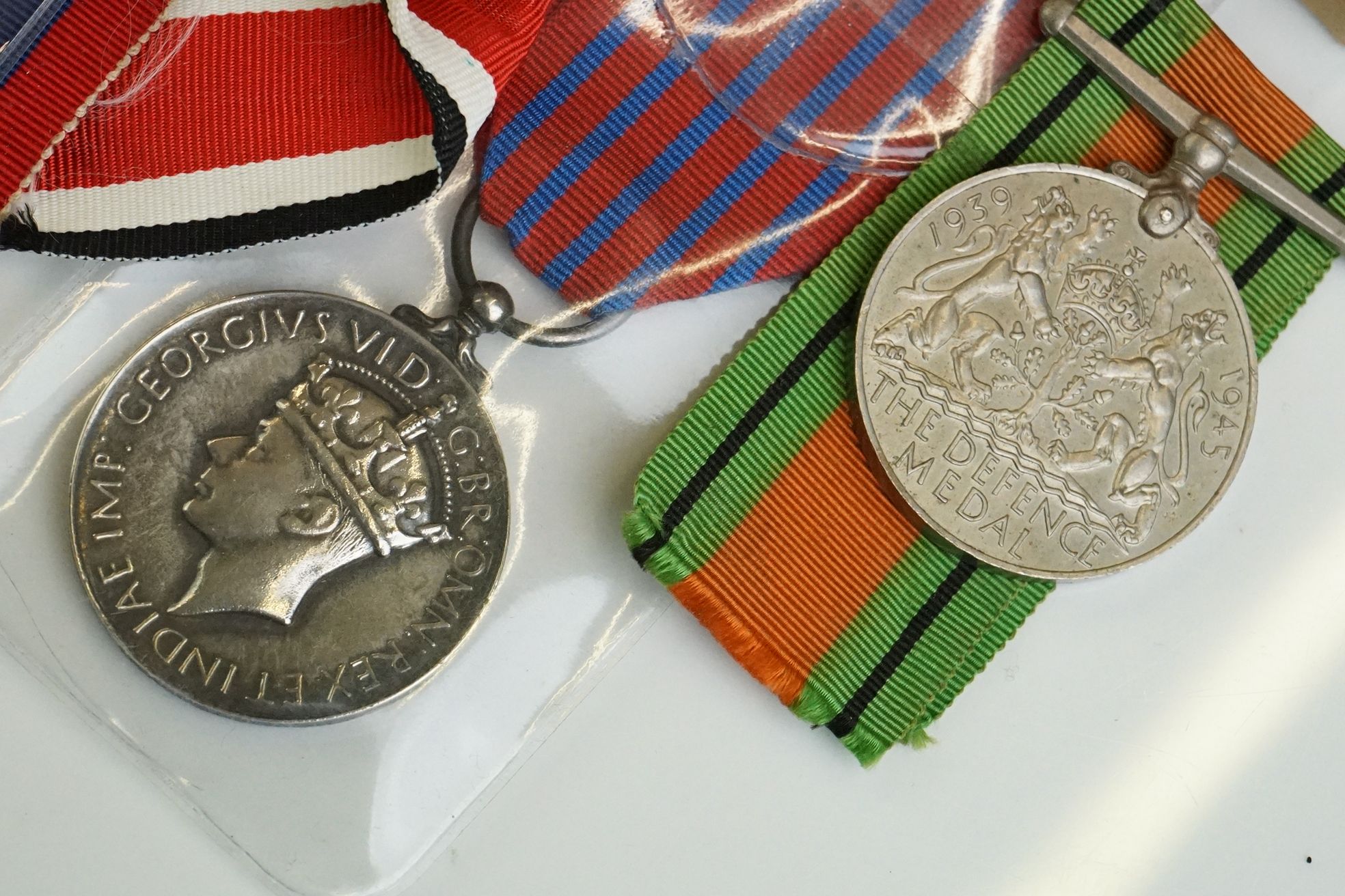 A group of military collectables to include a framed set of Royal Army Ordnance corps badges, a - Image 3 of 15