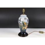 Moorcroft Pottery Table Lamp decorated in the Blackberry pattern, 37cm high to top of fittings