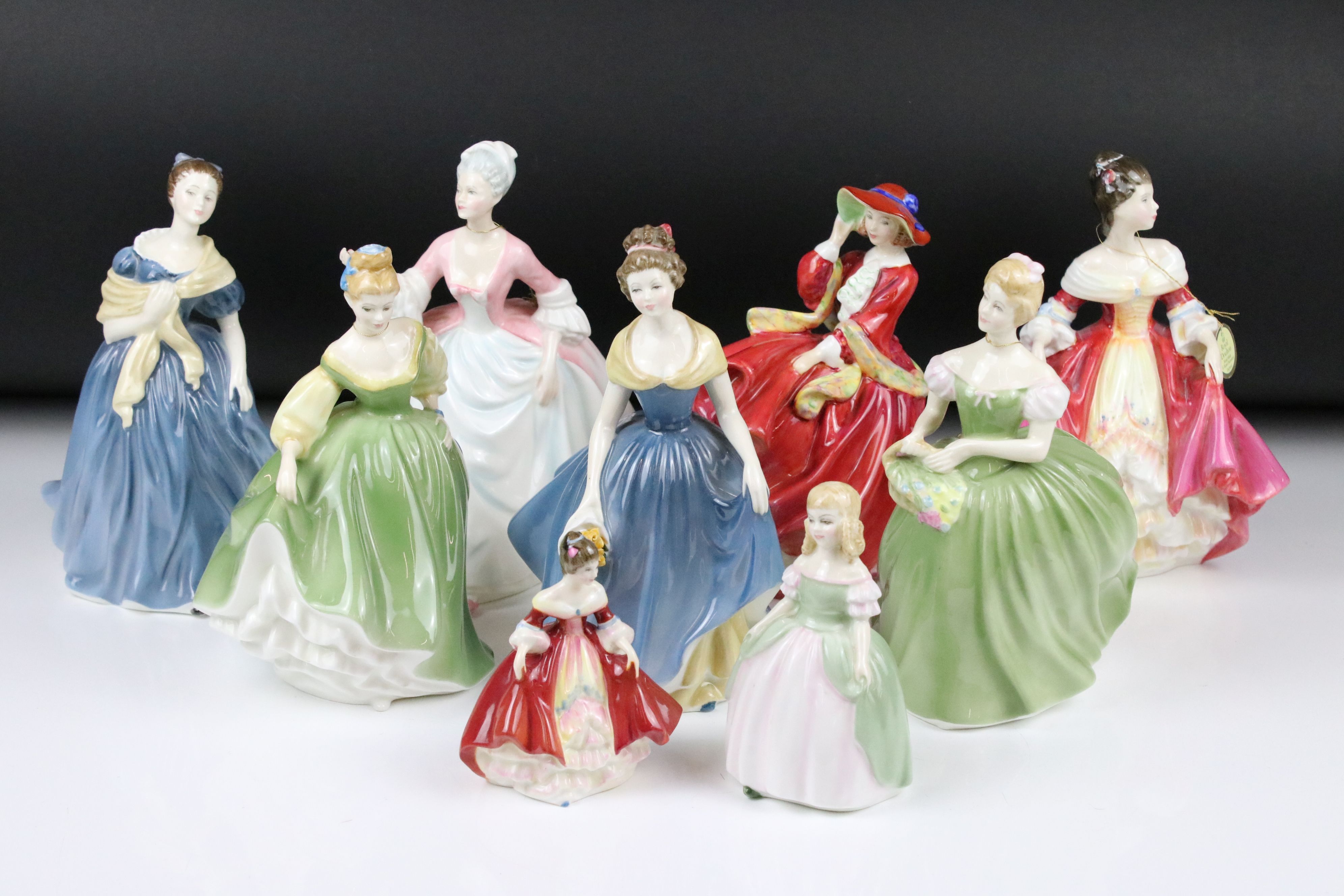Nine Royal Doulton figures to include: HN3266 'Diana', signed 'Michael Doulton 19 July 1990', HN2229