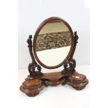 Victorian Mahogany Oval Swing Mirror held on a shaped base with two hinged lid compartments, 80cm