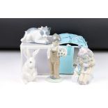 Two Lladro figures, comprising: 5279 'Pierrot with Concertina', 5907 'Sitting Bunny' and two Nao