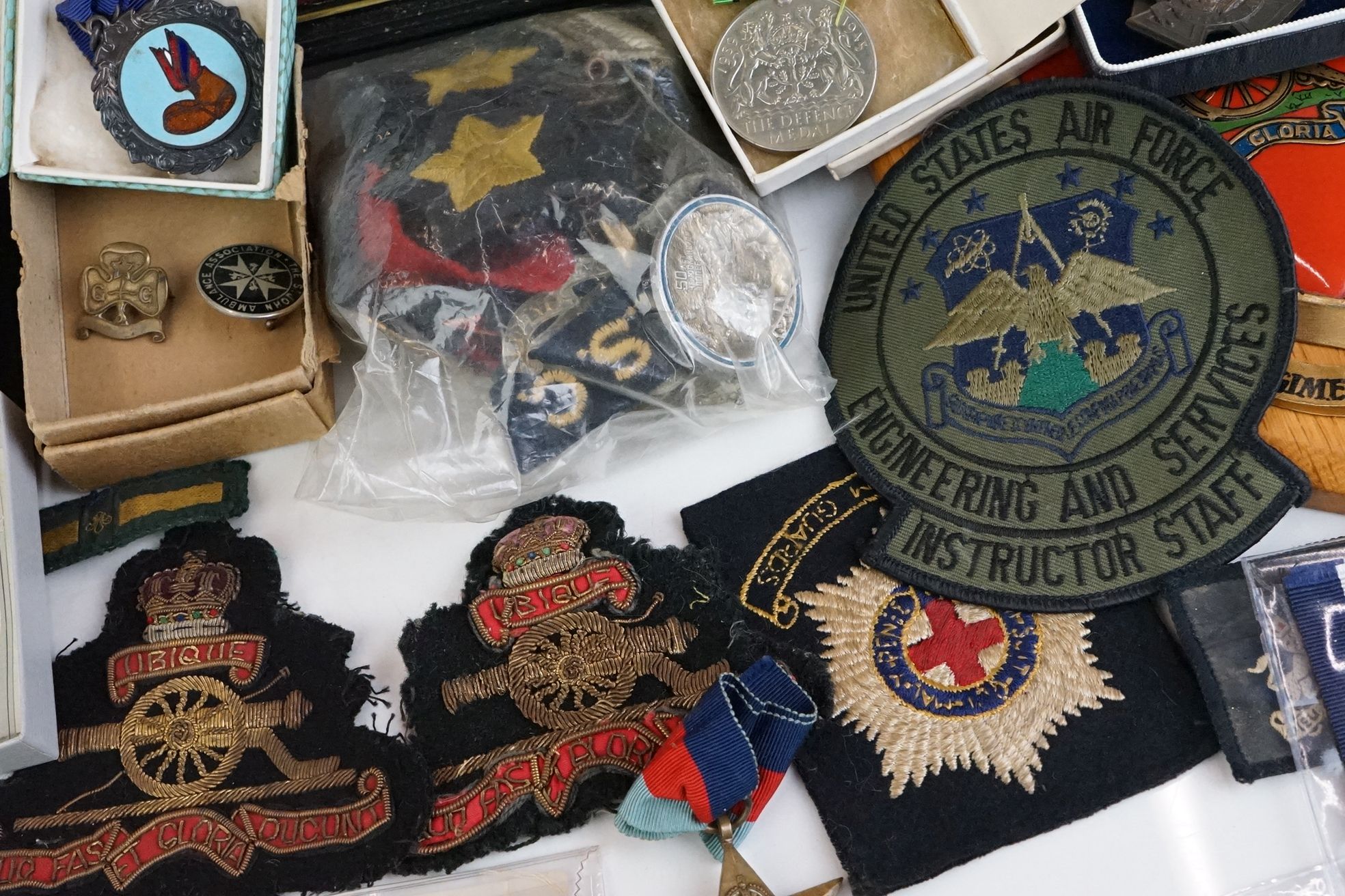 A group of military collectables to include a framed set of Royal Army Ordnance corps badges, a - Image 11 of 15