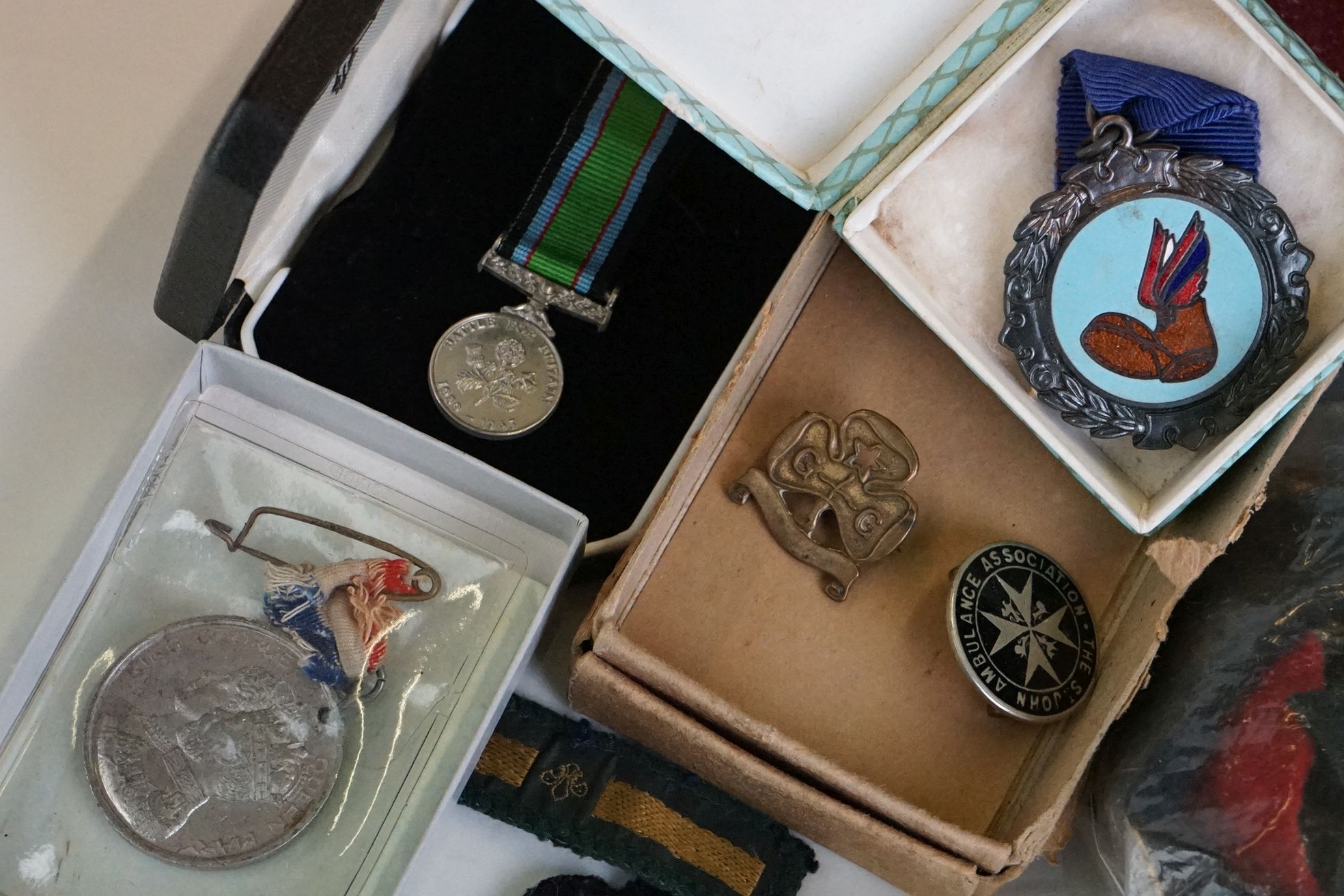 A group of military collectables to include a framed set of Royal Army Ordnance corps badges, a - Image 10 of 15