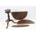 George III Oak Tilt Top Supper Table raised on turned support with three splayed legs (currently