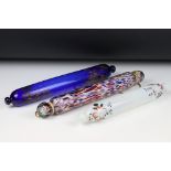 Three Victorian glass rolling pins, comprising: a blue glass example, transfer decorated with