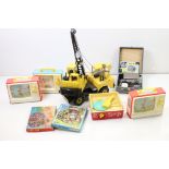 A collection of late 20th century toys to include a large Tonka mobile crane, fisher price record