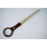 Combination Paper Knife and Magnifying Glass with fleur de lys decoration, 19cm long