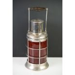 White Metal and Red Glass Cocktail Shaker in the form of a Lantern with swing handle, 32cm high