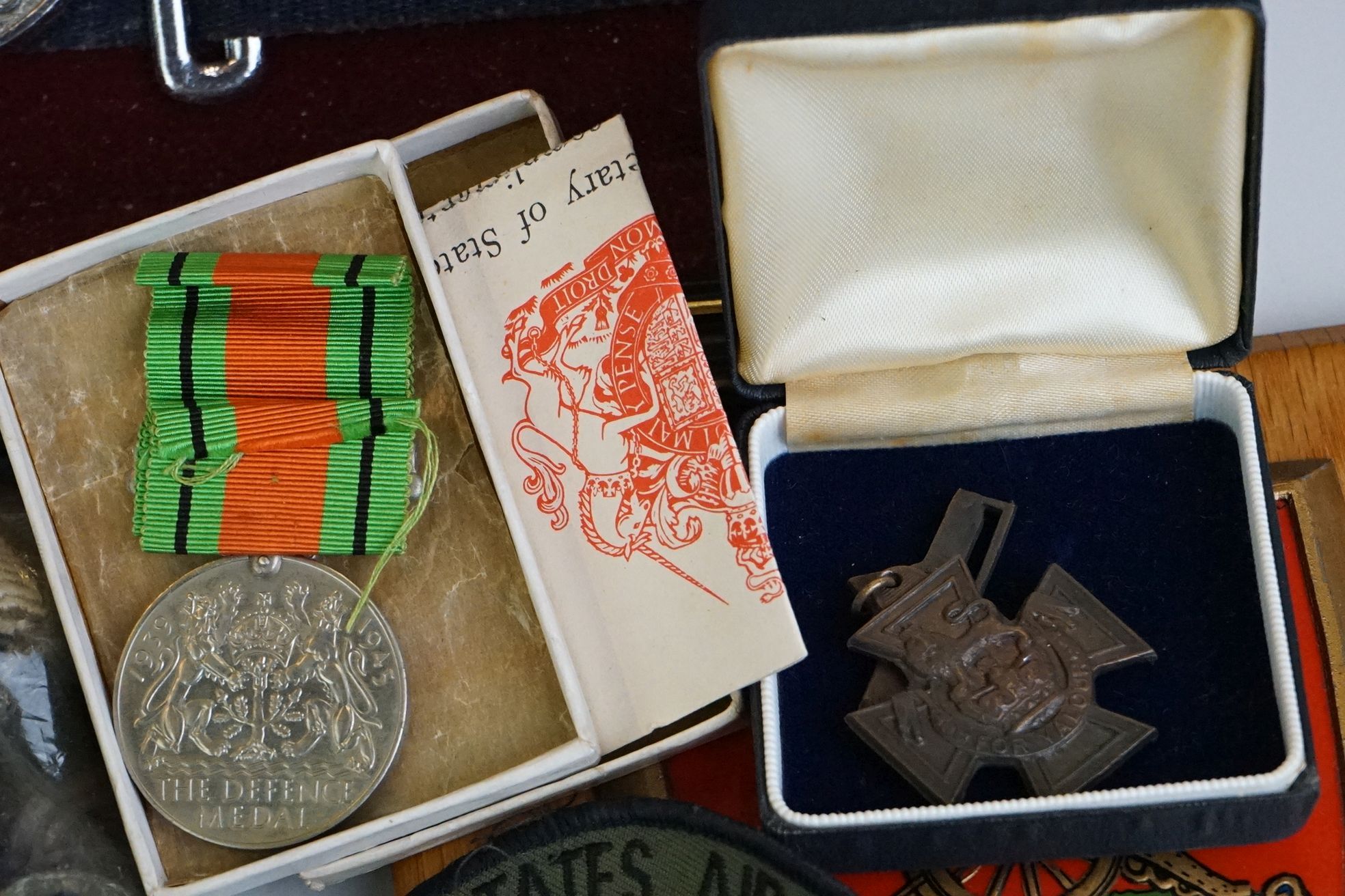 A group of military collectables to include a framed set of Royal Army Ordnance corps badges, a - Image 12 of 15