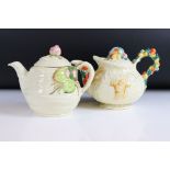 Two Clarice Cliff Newport Pottery Tea Pots, one in the Water Lily pattern with relief mark 30 and
