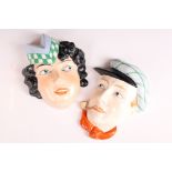 Pair of Mid century Czechoslovakian Hand painted Porcelain Wall Face Masks, one in the form of a man